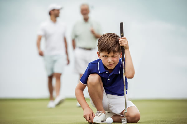 Father & Son Playing Golf ©One&Only Palmilla, Los Cabos